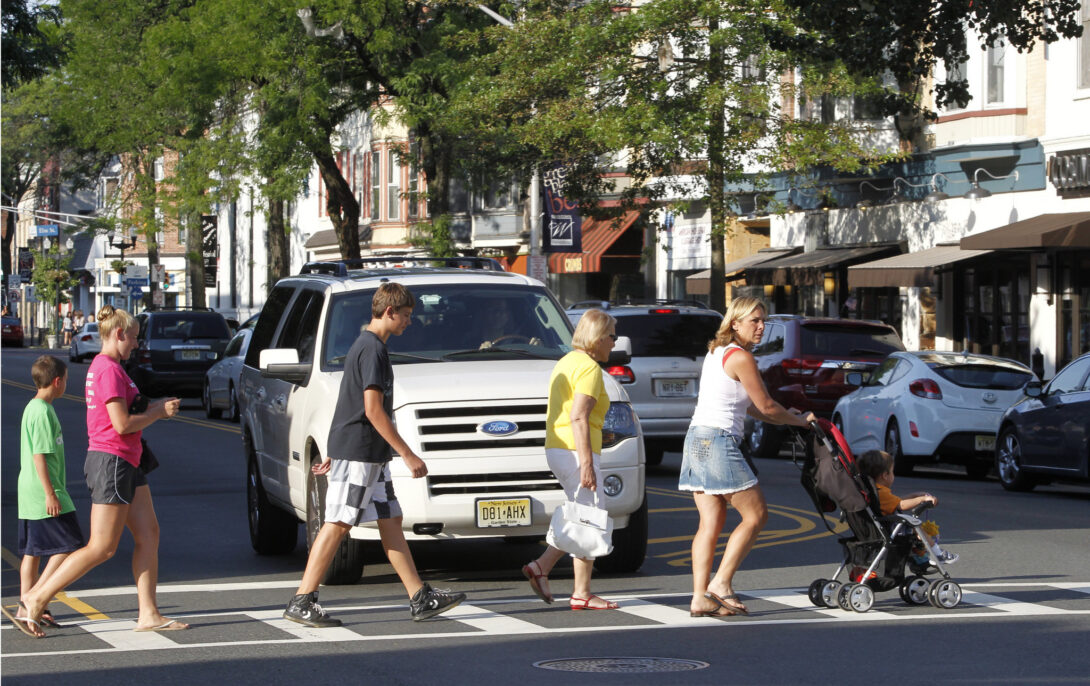 Car yielding to a group of pedestrians