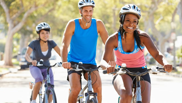 Friends happily biking around together