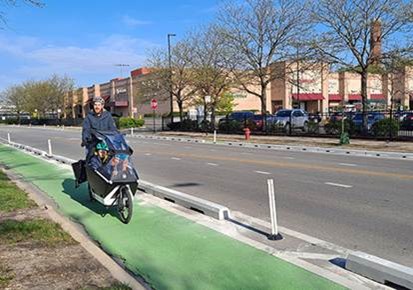Bike lane with concrete barriers and bollards