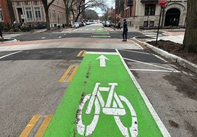 Neighborhood greenway with raised crosswalk to reduce vehicle street